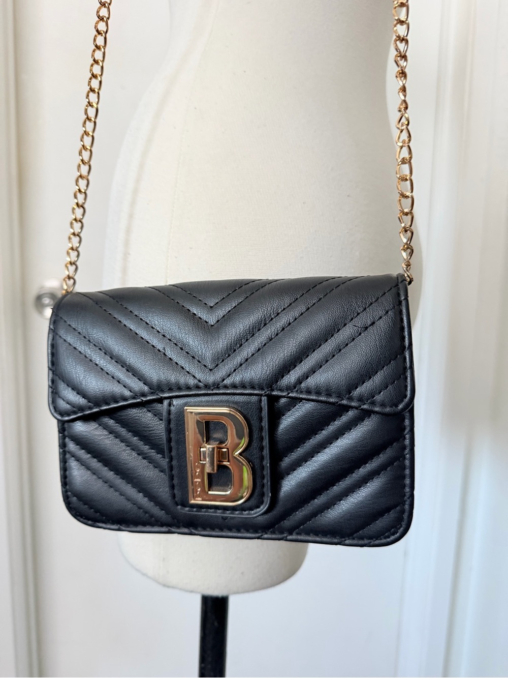 Black Quilted Crossbody Bag with Gold B Logo Hardware
